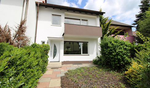 Spacious terraced house with small garden ready to move into