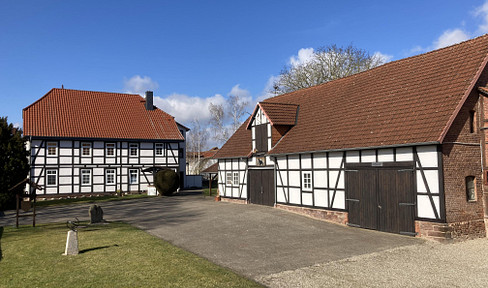 Beautiful multi-family house with 2 former agricultural buildings