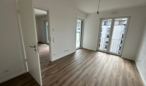 Erstbezug mit Fernblick – Ruhige, helle 2-Zimmer-Wohnung mit großem SW-Balkon und TG