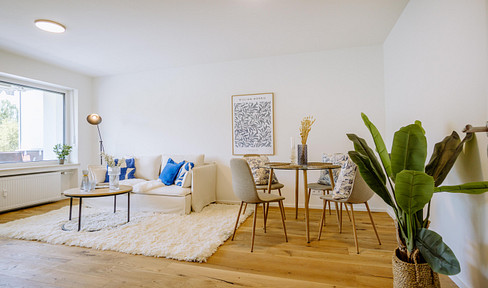 Attractive, freshly renovated 3-room apartment with two balconies and single garage in Dachau-Ost