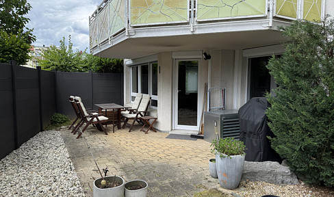 Modern 3-room first floor apartment with terrace, private garden and underground parking space