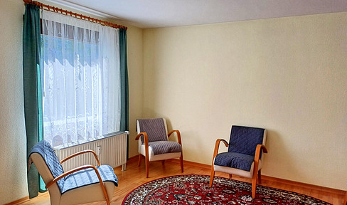 Grosszügige 2,5-Zimmer-Wohnung mit Gemeinschaftsgarten und Tiefgaragenstellplatz
