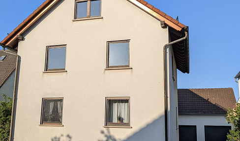 Well-maintained detached/two-family house in a quiet residential area