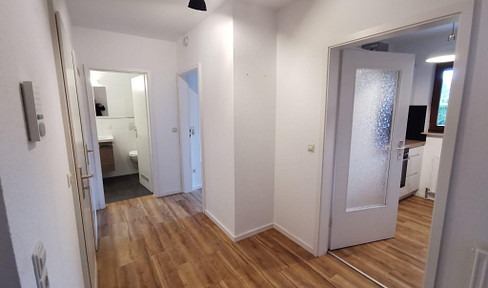 Freundliche 2-Zimmer-Wohnung mit Garten und Tiefgaragenstellplatz