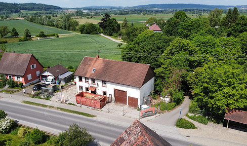 Spacious plot with building in need of renovation