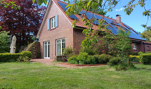 Modern country house with outbuilding in an idyllic location on the edge of the forest