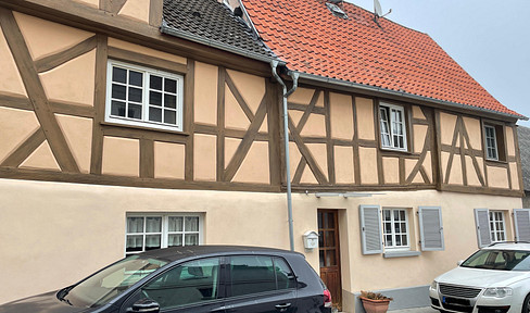 Half-timbered ensemble with three residential units