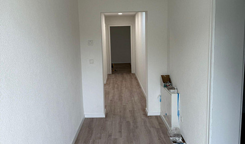 Refurbished first floor apartment with electric garage