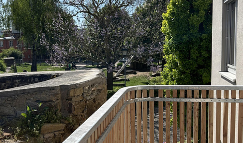 First occupancy: Sophisticated 3-room apartment with balcony in the city center