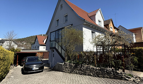 Charming and extensively modernized detached/two-family house