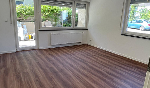Design trifft Komfort: Hochwertige EG-Wohnung mit Terasse, Stellplatz & Einbauküche