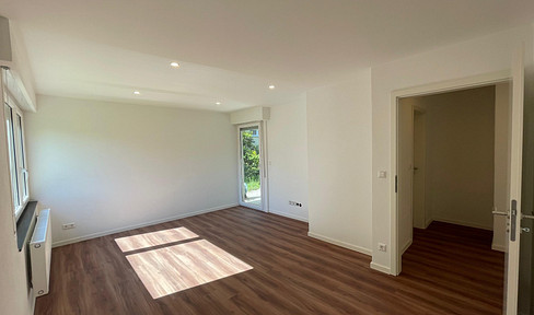 Design trifft Komfort: Hochwertige EG-Wohnung mit Terasse, Stellplatz & Einbauküche