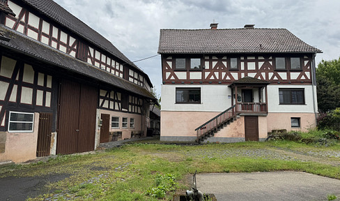 Charming half-timbered house / farmhouse with adjoining barns in an idyllic location