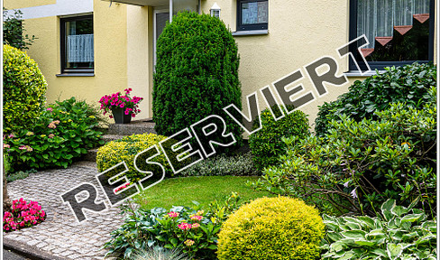 Extensively renovated mid-terrace house