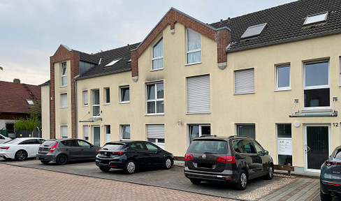 Light-flooded 3-room attic apartment with sun terrace in a top location in Langenfeld