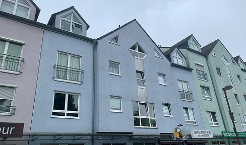Helle Dachgeschosswohnung mit West-Loggia und TG-Stellplatz