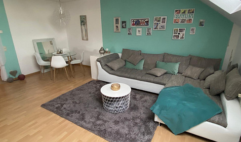 Attractive top-floor apartment with sunny balcony