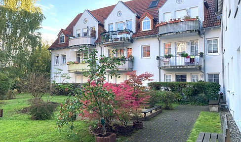 Beautiful and bright 2-room apartment in a quiet location with balcony and EBK