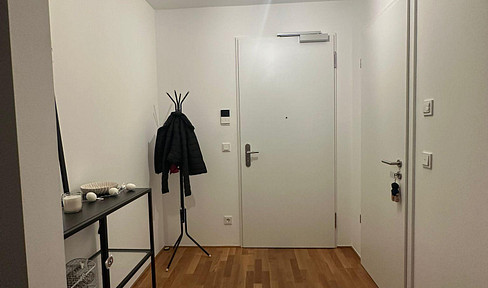 Modern 2-room apartment with balcony & underground parking space