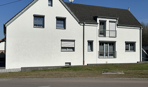 Modern residential building with 2 apartments; located directly on the edge of the forest; commission-free; available from the end of 2026