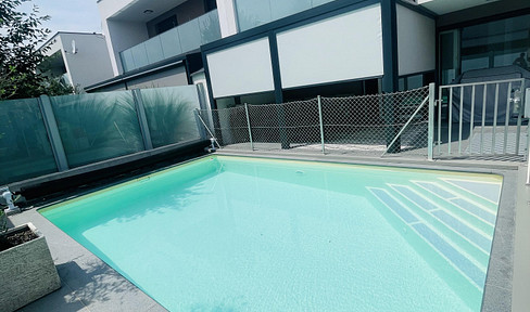 Exclusive semi-detached house with saltwater pool & high-quality furnishings!