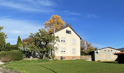 Large plot, large house with conservatory & income from truck garage