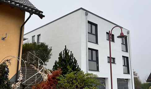 New-build apartment building with 3 residential units in a quiet location