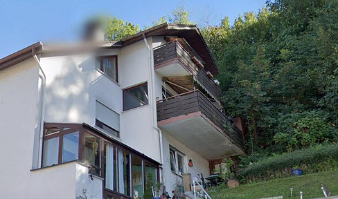 Split-level detached house on a slope