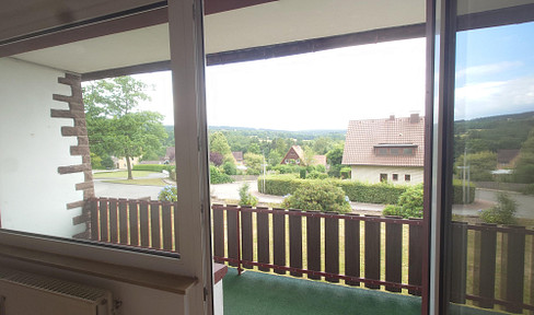 Well-kept 2-room apartment with balcony, large garden and optional parking space