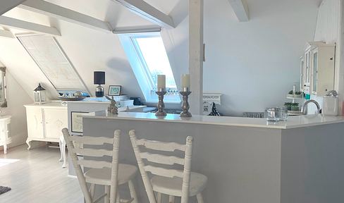 Bright 2-room attic apartment with garden & terrace