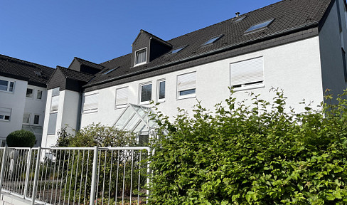Partly barrier-free 3-room first floor apartment with garden and underground parking garage
