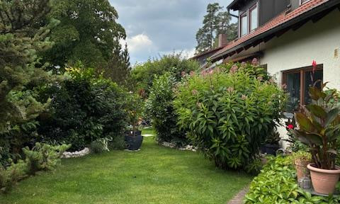 Green oasis on the edge of the forest 2-family house with dream location and garden
