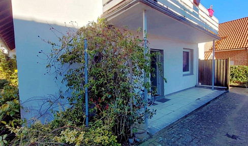 Centrally located apartment with terrace in Natrup-Hagen - unrenovated