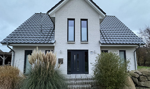 Charmantes Einfamilienhaus mit Einliegerwohnung, Fußbodenheizung und großem Garten