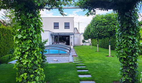 Semi-detached house as good as new with garden paradise, pool, sauna, etc.