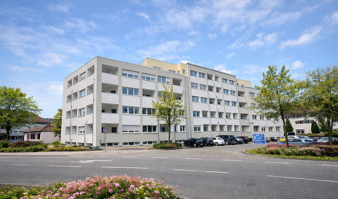 3-room apartment in a new development in the city center (KfW 55 standard), with 2 bathrooms, fitted kitchen, and a central location.