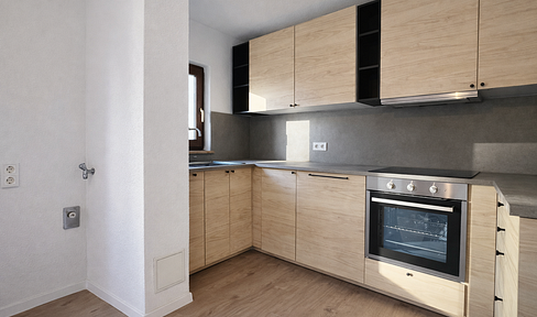 Renovated 4-room apartment with balcony, centrally located.