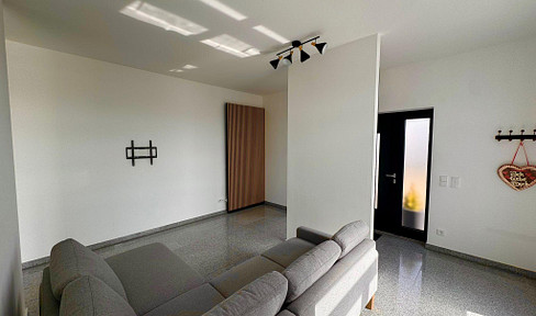 New 2.5-room ground floor apartment with terrace and fitted kitchen for rent