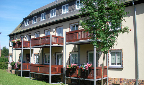 attractive 2-room apartment with fitted kitchen on the 1st floor