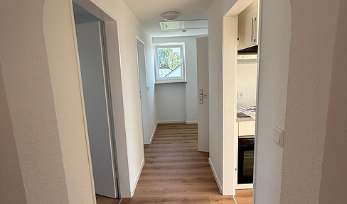 Bright, renovated attic apartment with a new fitted kitchen in a quiet location in Olching.