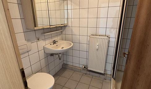 Charming 2-room top-floor apartment with balcony and parking space, also as an investment