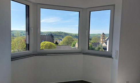 Dream home with far-reaching views: Commission-free first-occupancy maisonette with garden & garage!