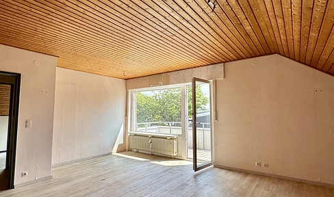 Sunny top-floor apartment with far-reaching views & potential