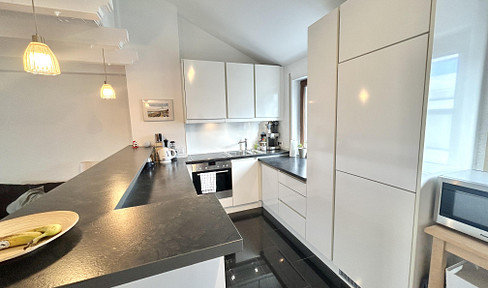 Highlight: Airy maisonette apartment with fireplace, elevator, fitted kitchen and sunny balcony