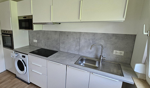 Fully renovated 3-room 71 sqm apartment with fitted kitchen, balcony and garage