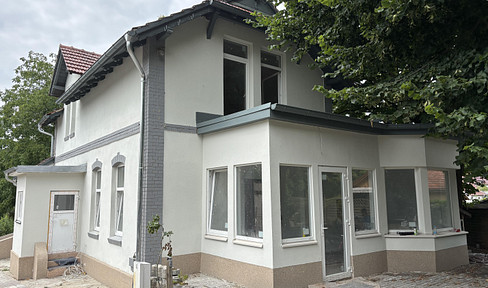 Residential and commercial building in green Schmöckwitz