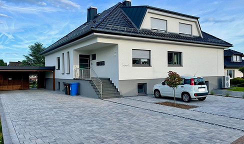 Great 3-room top floor apartment with carport parking space