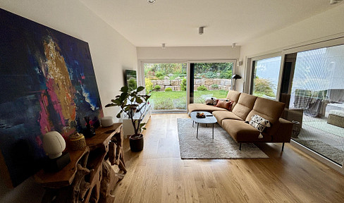 Design meets nature - Furnished new-build apartment with beautiful garden