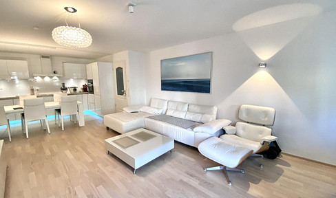 Exclusive 3-room city villa garden apartment with south-facing terrace & underground parking in prime Moosach location - quiet, sunny