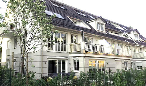 Exclusive 3-room city villa garden apartment with south-facing terrace & underground parking in prime Moosach location - quiet, sunny